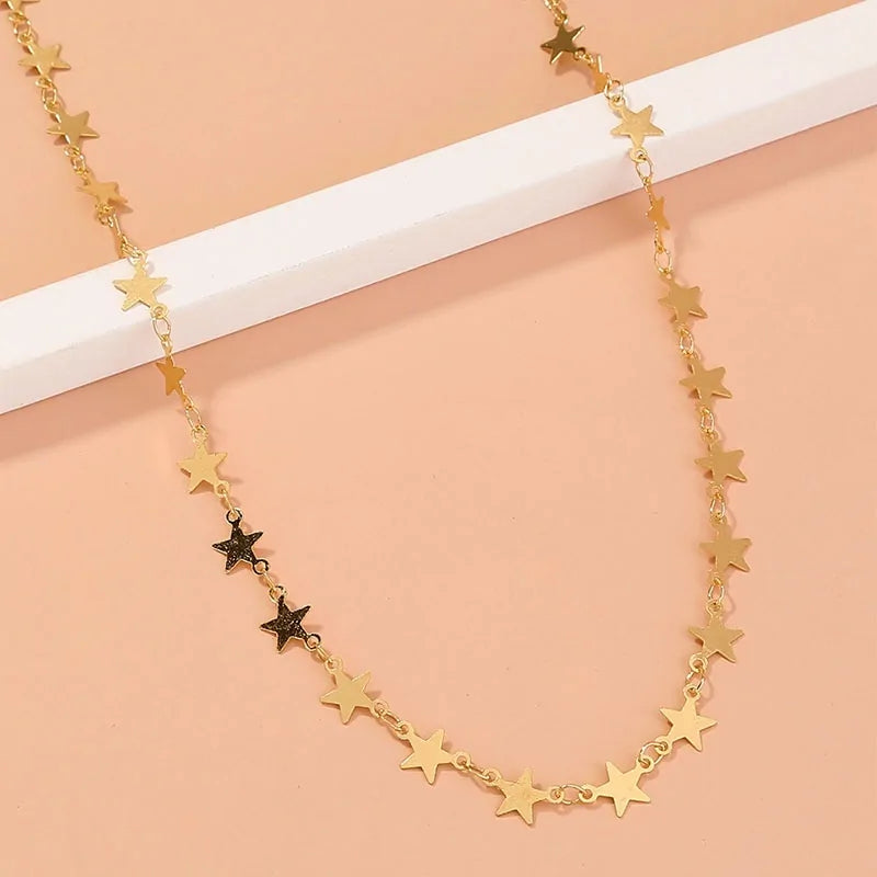 Gold star choker necklace